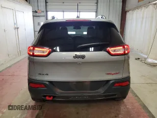 2017 Jeep Cherokee Trailhawk L Plus with VIN 1C4PJMBBXHW666051, listed as a Copart auction lot 51605455 with 99,259 mi miles and Salvage Title. Bid and sale history available at carsss.com. Image 6.