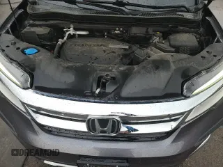 2020 Honda Pilot Touring 8-Passenger z VIN 5FNYF6H90LB046599, wystawiony jako Copart lot #85332205 z przebiegiem 58 170 mil mil oraz Szkoda całkowita • Salvage title. Historia ofert i sprzedaży dostępna na DreamBid. Obrazek 16.