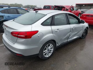 2017 Ford Focus SE with VIN 1FADP3F24HL303600, listed as a IAAI auction lot 41948159 with 95,212 mi miles and . Bid and sale history available at DreamBid. Image 4.