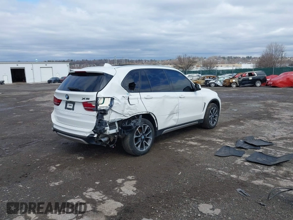 2017 BMW X5 xDrive35i with VIN 5UXKR0C3XH0X82080, listed as a IAAI auction lot 41820700 with 126,235 mi miles. Bid and sale history available at carsss.com. Image 4.