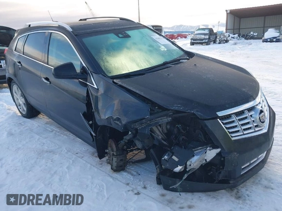 2015 Cadillac SRX Premium Collection with VIN 3GYFNGE38FS593965, listed as a IAAI auction lot 41602374 with 97,949 mi miles. Bid and sale history available at carsss.com. Image 1.