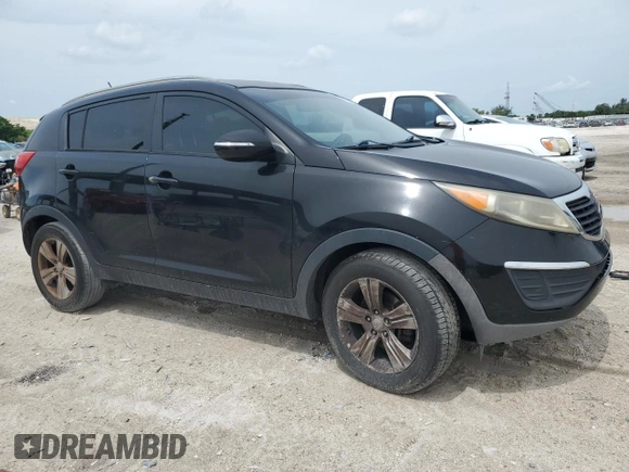 2013 Kia Sportage LX z VIN KNDPB3A20D7393554, wystawiony jako Copart lot #59036015 z przebiegiem 145 977 mil mil oraz Szkoda całkowita • Salvage title. Historia ofert i sprzedaży dostępna na DreamBid. Obrazek 4.
