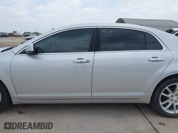 2012 Chevrolet Malibu LTZ with VIN 1G1ZG5E72CF313664, listed as a IAAI auction lot 42055669 with 97,053 mi miles and . Bid and sale history available at DreamBid. Image 14.