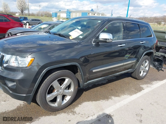 2011 Jeep Grand Cherokee Limited with VIN 1J4RR5GG4BC624876, listed as a IAAI auction lot 41877272 with 166,810 mi miles. Bid and sale history available at carsss.com. Image 18.