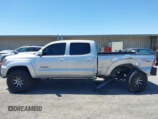 2013 Toyota Tacoma with VIN 3TMMU4FN2DM055326, listed as a IAAI auction lot 42560152 with 198,406 mi miles and . Bid and sale history available at DreamBid. Image 14.