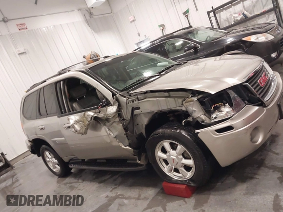 2003 GMC Envoy SLT with VIN 1GKDT13S932395367, listed as a IAAI auction lot 41544810 with 142,012 mi miles. Bid and sale history available at carsss.com. Image 12.