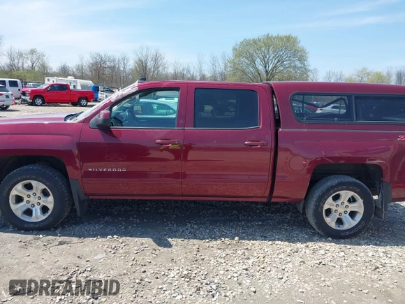 2015 Chevrolet Silverado 1500 LT with VIN 3GCUKREC0FG428366, listed as a IAAI auction lot 42210969 with 118,352 mi miles and . Bid and sale history available at DreamBid. Image 14.