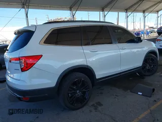 2022 Honda Pilot Special Edition with VIN 5FNYF5H29NB018557, listed as a IAAI auction lot 41402547 with 22,935 mi miles and . Bid and sale history available at carsss.com. Image 4.