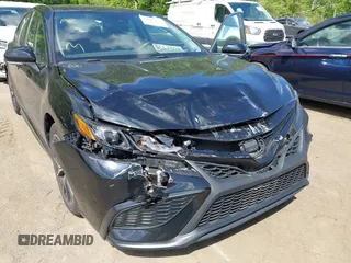 2023 Toyota Camry SE with VIN 4T1G11AK2PU828745, listed as a IAAI auction lot 42193957 with 35,399 mi miles and . Bid and sale history available at carsss.com. Image 6.