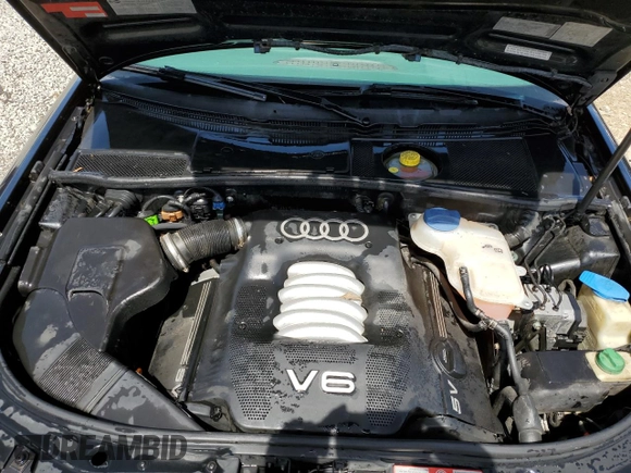 1999 Audi A6 z VIN WAUBA34B6XN119393, wystawiony jako Copart lot #54181235 z przebiegiem 145 925 mil mil oraz Nie do naprawy • Non repairable. Historia ofert i sprzedaży dostępna na DreamBid. Obrazek 11.