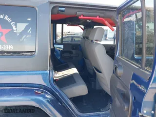 2010 Jeep Wrangler Unlimited Sport with VIN 1J4BA3H18AL105500, listed as a IAAI auction lot 41634465 with 230,453 mi miles. Bid and sale history available at carsss.com. Image 8.