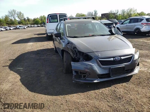 2018 Subaru Impreza z VIN 4S3GTAA65J3747060, wystawiony jako Copart lot #55040805 z przebiegiem 77 143 mil mil oraz Szkoda całkowita • Salvage title. Historia ofert i sprzedaży dostępna na DreamBid. Obrazek 13.