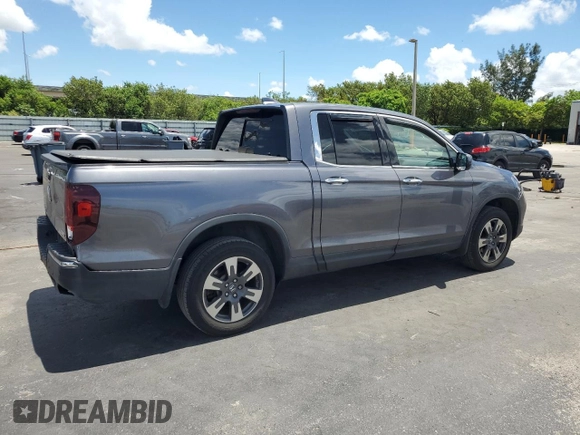2017 Honda Ridgeline RTL-E with VIN 5FPYK3F74HB027130, listed as a Copart auction lot 60146905 with 99,964 mi miles and Salvage title. Bid and sale history available at DreamBid. Image 3.