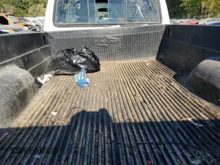 1990 Ford F-250 with VIN 1FTHF26H2LNA64235, listed as a Copart auction lot 74459134 with 249,821 mi miles and Salvage Title. Bid and sale history available at carsss.com. Image 10.