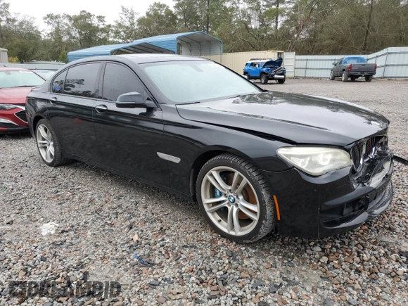 2013 BMW 7 Series 750Li z VIN WBAYE8C53DD131817, wystawiony jako Copart lot #79615564 z przebiegiem 125 737 mil mil oraz Szkoda całkowita • Salvage title. Historia ofert i sprzedaży dostępna na DreamBid. Obrazek 4.