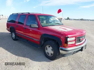 1999 GMC Suburban with VIN 1GKFK16RXXJ809823, listed as a IAAI auction lot 41687406 with 360,799 mi miles. Bid and sale history available at carsss.com. Image 6.