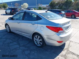 2013 Hyundai Accent GLS with VIN KMHCU4AE2DU429055, listed as a IAAI auction lot 41869804 with 126,094 mi miles. Bid and sale history available at carsss.com. Image 3.