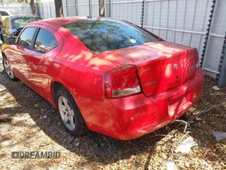 2009 Dodge Charger SXT with VIN 2B3KA33V49H556093, listed as a IAAI auction lot 42048956 with 164,284 mi miles. Bid and sale history available at carsss.com. Image 3.