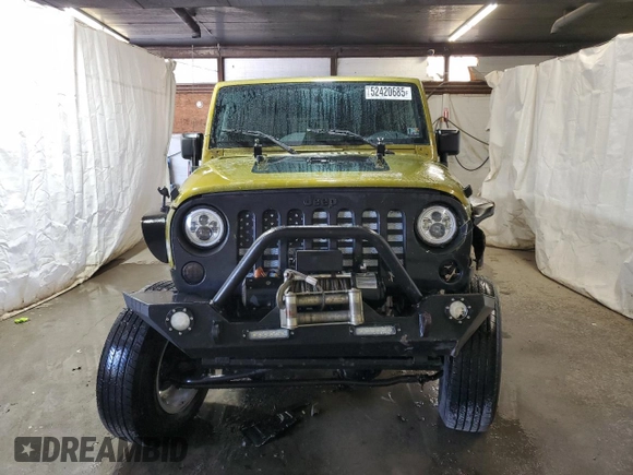 2007 Jeep Wrangler Unlimited X with VIN 1J4GA39187L190061, listed as a Copart auction lot 52420685 with 217,346 mi miles and Salvage Title. Bid and sale history available at DreamBid. Image 5.