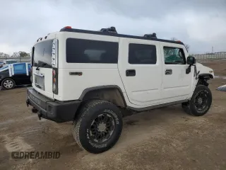 2003 Hummer H2 with VIN 5GRGN23U63H106158, listed as a Copart auction lot 81266274 with 275,953 mi miles and Salvage Title. Bid and sale history available at carsss.com. Image 3.