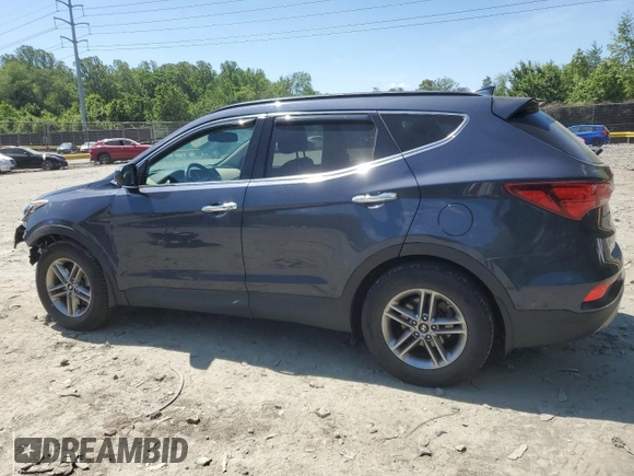 2017 Hyundai Santa Fe 2.4L z VIN 5NMZUDLB7HH028678, wystawiony jako Copart lot #57557855 z przebiegiem 102 049 mil mil oraz Szkoda całkowita • Salvage title. Historia ofert i sprzedaży dostępna na DreamBid. Obrazek 2.