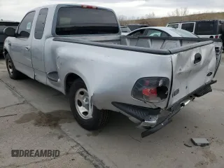 1998 Ford F-150 with VIN 2FTZX0729WCA50004, listed as a Copart auction lot 50028895 with 291,952 mi miles and Salvage title. Bid and sale history available at DreamBid. Image 2.