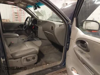 2004 Chevrolet TrailBlazer EXT LT with VIN 1GNET16P046158436, listed as a IAAI auction lot 41707323 with 163,328 mi miles. Bid and sale history available at carsss.com. Image 5.