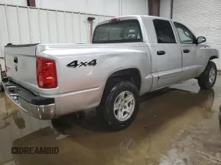 2006 Dodge Dakota SLT with VIN 1D7HW48K16S710932, listed as a Copart auction lot 47996455 with 221,677 mi miles and Salvage Title. Bid and sale history available at carsss.com. Image 3.