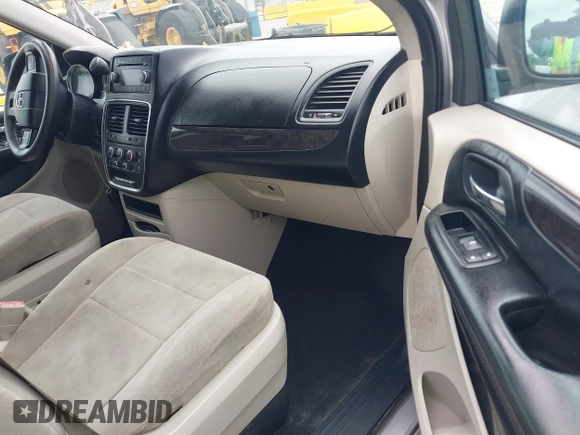 2012 Dodge Grand Caravan SXT with VIN 2C4RDGCG3CR308173, listed as a IAAI auction lot 42255879 with 96,489 mi miles and . Bid and sale history available at DreamBid. Image 5.