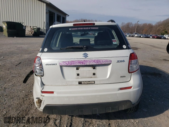 2012 Suzuki SX4 Crossover with VIN JS2YB5A32C6303887, listed as a Copart auction lot 82214144 with 0 mi miles and Salvage Title. Bid and sale history available at carsss.com. Image 6.
