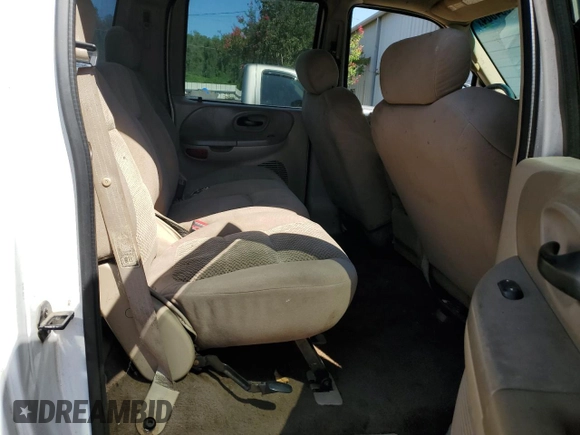 2003 Ford F-150 XLT with VIN 1FTRW08L23KD65857, listed as a Copart auction lot 71634004 with 321,505 mi miles and Clean Title. Bid and sale history available at carsss.com. Image 10.