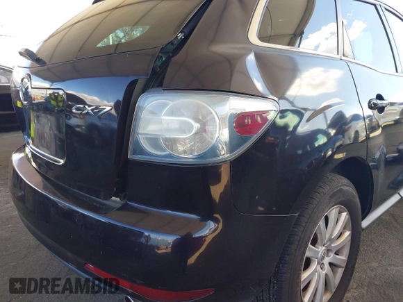 2012 Mazda CX-7 i Touring z VIN JM3ER2CMXC0421774, wystawiony jako IAAI lot #41743231 z przebiegiem 132 488 mil mil oraz . Historia ofert i sprzedaży dostępna na DreamBid. Obrazek 14.