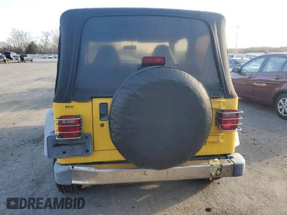 2000 Jeep Wrangler SE with VIN 1J4FA29PXYP775373, listed as a Copart auction lot 84903874 with 74,620 mi miles and Clean Title. Bid and sale history available at carsss.com. Image 6.