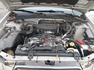 2003 Subaru Forester XS with VIN JF1SG65663H753306, listed as a IAAI auction lot 41311689 with 253,269 mi miles. Bid and sale history available at carsss.com. Image 10.