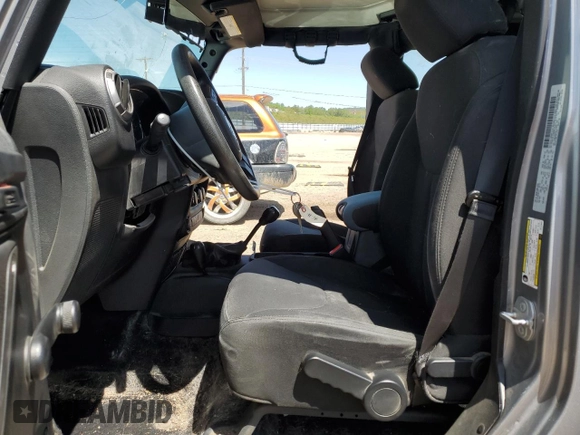 2016 Jeep Wrangler Unlimited Freedom with VIN 1C4BJWDG7GL117972, listed as a Copart auction lot 57996765 with 56,713 mi miles and Salvage title. Bid and sale history available at DreamBid. Image 7.