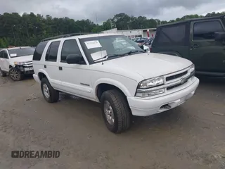 2002 Chevrolet Blazer LS z VIN 1GNDT13W12K155699, wystawiony jako IAAI lot #42558320 z przebiegiem 104 072 mil mil oraz . Historia ofert i sprzedaży dostępna na DreamBid. Obrazek 1.