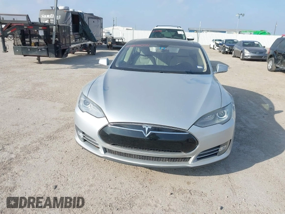 2013 Tesla Model S with VIN 5YJSA1CG3DFP28908, listed as a IAAI auction lot 41804041 with 140,756 mi miles and . Bid and sale history available at DreamBid. Image 10.