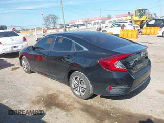 2018 Honda Civic LX with VIN 2HGFC2F52JH561461, listed as a IAAI auction lot 42030164 with 125,875 mi miles. Bid and sale history available at carsss.com. Image 3.