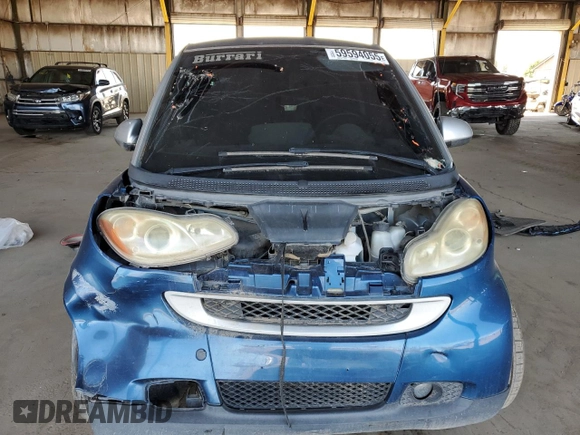 2010 Smart fortwo Pure с VIN WMEEJ3BA1AK360041, выставлен на аукционе Copart как лот 59594055 с пробегом Не указан миль и Списание • Salvage title. История ставок и продаж доступна на DreamBid. Изображение 5.