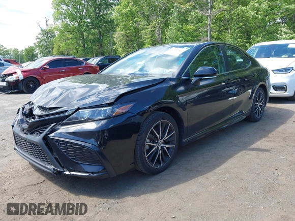 2023 Toyota Camry SE with VIN 4T1G11AK2PU828745, listed as a IAAI auction lot 42193957 with 35,399 mi miles and . Bid and sale history available at carsss.com. Image 2.