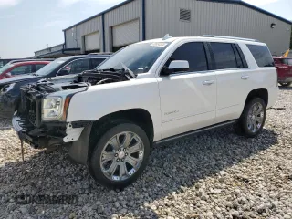 2016 GMC Yukon Denali with VIN 1GKS1CKJ3GR403865, listed as a Copart auction lot 68534264 with 129,655 mi miles and Salvage Title. Bid and sale history available at carsss.com. Image 1.