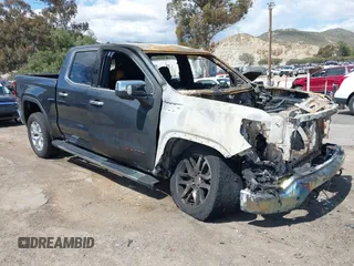 2019 GMC Sierra 1500 SLT z VIN 3GTP8DED1KG229179, wystawiony jako IAAI lot #41932481 z przebiegiem Nie podano mil oraz . Historia ofert i sprzedaży dostępna na DreamBid. Obrazek 1.