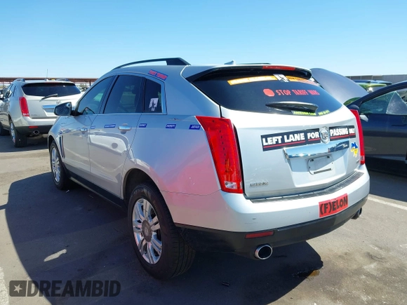 2014 Cadillac SRX with VIN 3GYFNAE31ES576016, listed as a IAAI auction lot 42130992 with 160,114 mi miles and . Bid and sale history available at DreamBid. Image 3.
