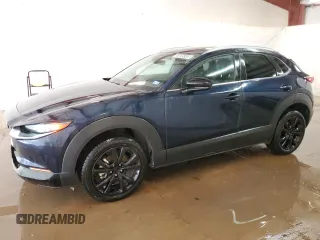 2024 Mazda CX-30 S Select Sport z VIN 3MVDMBBMXRM654255, wystawiony jako Copart lot #55695305 z przebiegiem 19 125 mil mil oraz Szkody całkowita. Historia ofert i sprzedaży dostępna na DreamBid. Obrazek 1.