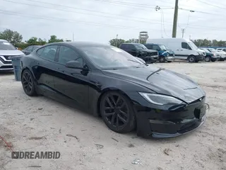 2023 Tesla Model S with VIN 5YJSA1E52PF500088, listed as a IAAI auction lot 41372918 with Not provided miles and . Bid and sale history available at DreamBid. Image 1.