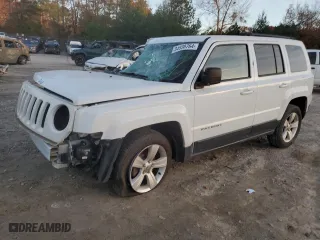 2016 Jeep Patriot Latitude with VIN 1C4NJRFB9GD718469, listed as a Copart auction lot 84938764 with 156,867 mi miles and Salvage Title. Bid and sale history available at carsss.com. Image 1.