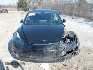 2022 Tesla Model 3 with VIN 5YJ3E1EA1NF304811, listed as a IAAI auction lot 41559342 with 29,597 mi miles and . Bid and sale history available at DreamBid. Image 11.