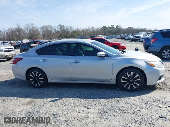 2018 Nissan Altima SR with VIN 1N4AL3AP6JC132730, listed as a IAAI auction lot 41585178 with 128,882 mi miles and . Bid and sale history available at DreamBid. Image 13.