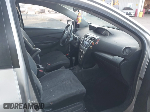 2007 Toyota Yaris with VIN JTDBT923271012408, listed as a IAAI auction lot 41987380 with 202,274 mi miles. Bid and sale history available at carsss.com. Image 5.