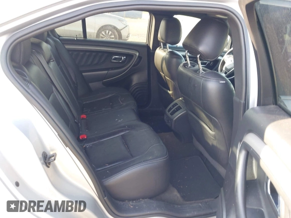 2013 Ford Taurus SEL with VIN 1FAHP2H88DG171375, listed as a IAAI auction lot 42110345 with 169,000 mi miles and . Bid and sale history available at DreamBid. Image 8.